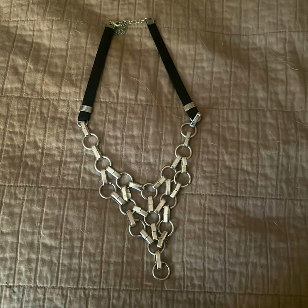 Black chain silver necklace, never worn. New. No tags. Doesn’t fit my style.